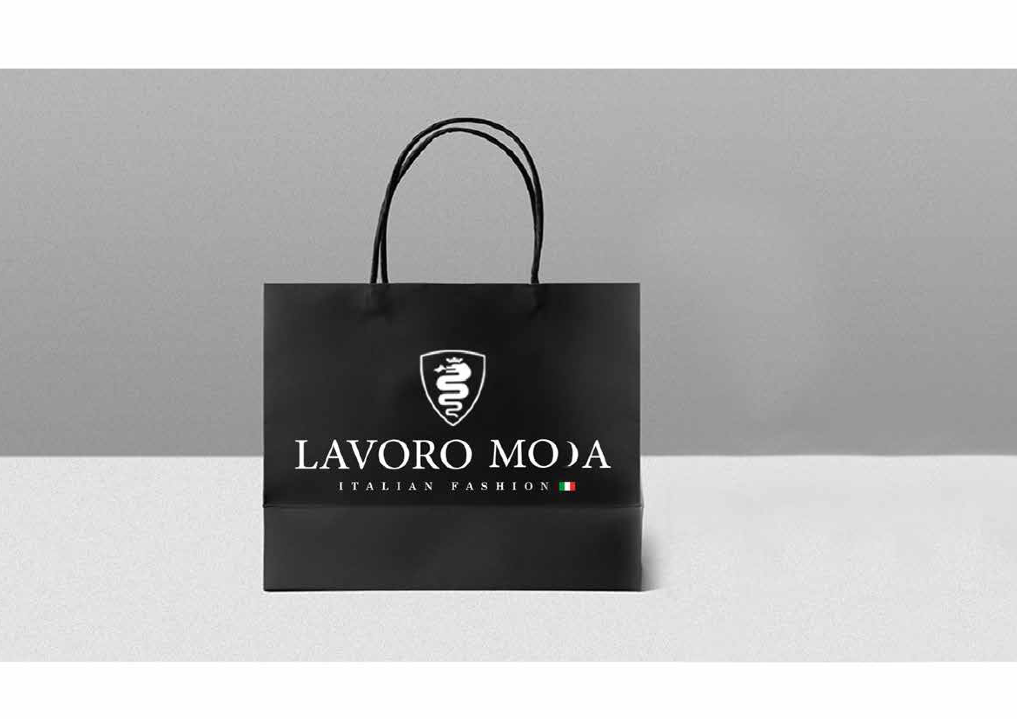 Lavoro Moda brand stationery including business card, envelope and letterhead with brand application